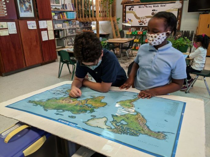 Studying continents and oceans.