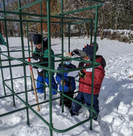 Xavier, Jeremie and Dahvid interpret the directions.