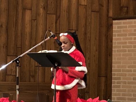 Leila reads scripture.