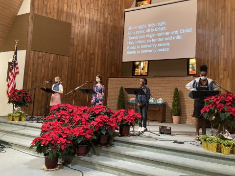 Regan, Clarajane, Cynthia and Esther lead song service.