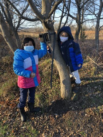 Jasmin and Jeremie check the nature cam.