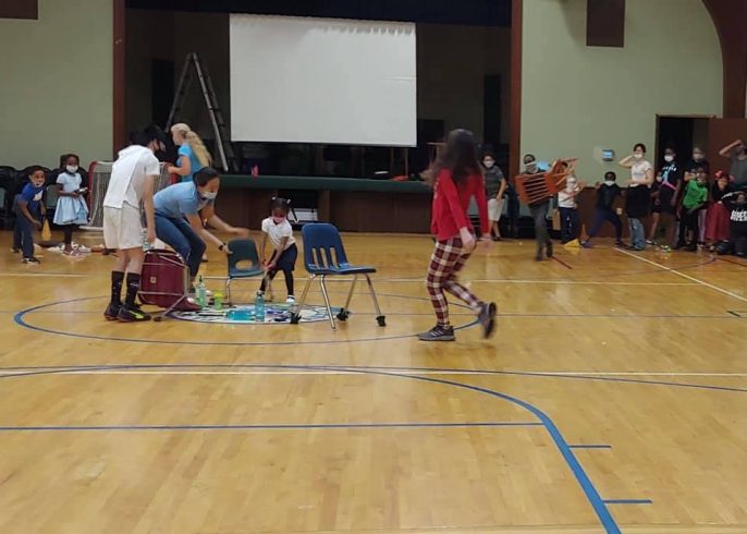 All teams race to bring a chair to the center of the gym. First team there earns a point!